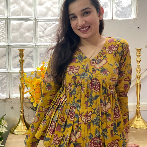 Yellow Printed Peplum Top